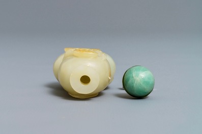 A Chinese pale celadon and russet jade double gourd snuff bottle, 19th C.