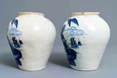 A pair of Dutch Delft blue and white tobacco jars with native American indians, 18th C.