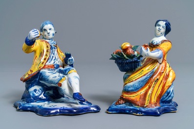 A pair of polychrome Dutch Delft allegorical figures, 18th C.