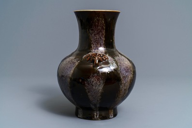 A Chinese brown flamb&eacute;-glazed hu vase, Kangxi mark, 19th C.