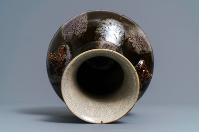 A Chinese brown flamb&eacute;-glazed hu vase, Kangxi mark, 19th C.