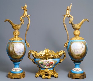 A pair of massive gilt bronze-mounted S&egrave;vres porcelain ewers and a jardini&egrave;re, France, 19th C.