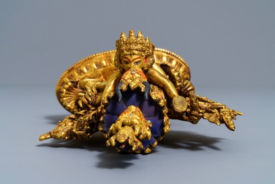 A Sino-Tibetan painted gilt bronze figure of Yamantaka and consort, 19/20th C.