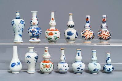 Thirteen Chinese blue and white and famille verte miniature vases, Kangxi and later