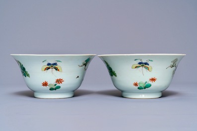 A pair of Chinese famille verte 'peacock among blossoms' bowls, Kangxi