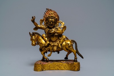 A Tibetan gilt bronze figure of Palden Lhamo, 17th C.