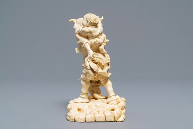 A signed Japanese ivory okimono, Meiji, 19th C.