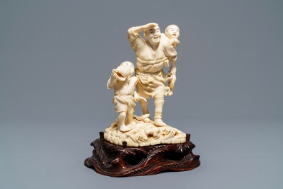 A signed Japanese ivory okimono, Meiji, 19th C.