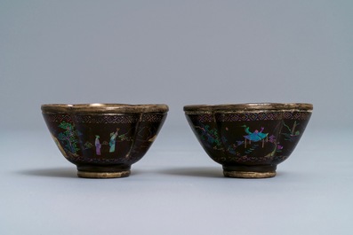 A pair of Chinese silver and lac burgaute quatrefoil cups and saucers, Kangxi