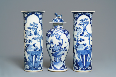 Four Chinese blue and white vases and a jardini&egrave;re, 19th C.