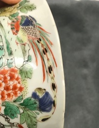 A pair of Chinese famille verte 'peacock among blossoms' bowls, Kangxi