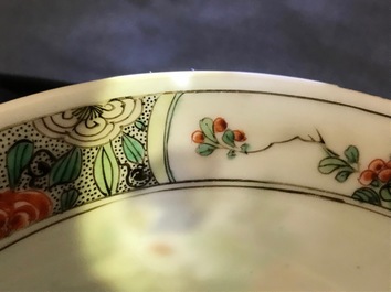 A pair of Chinese famille verte 'peacock among blossoms' bowls, Kangxi