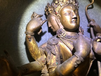 A Sino-Tibetan inlaid gilt bronze figure of Ushnishavijaya, 17/18th C.