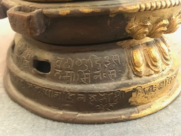 A Tibetan inscribed gilt bronze group of Manjusri and Prajnaparamita, 17/18th C.