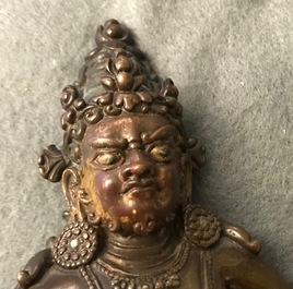 A Sino-Tibetan bronze figure of Jambhala, 17/18th C.