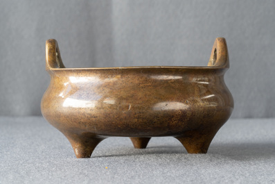 A Chinese bronze tripod censer, Xuande mark, 19th C.