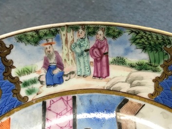 A pair of Chinese Canton famille rose cups and saucers inscribed for Van Speyk and dated 1831