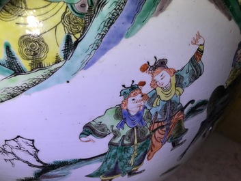 A large Chinese famille verte fish bowl with a narrative scene all-round, 19th C.