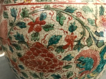 A Chinese polychrome Swatow jar with Buddhist lions among peony scrolls, Ming