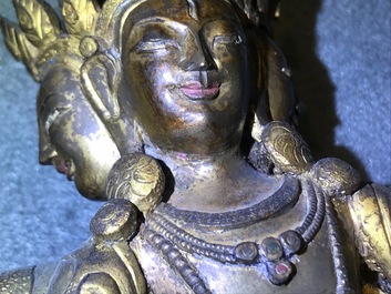 A Sino-Tibetan inlaid gilt bronze figure of Ushnishavijaya, 18th C.