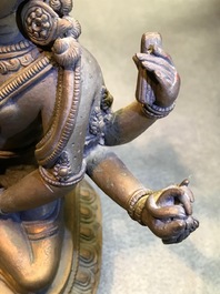 Une figure de Vasudhara en bronze dor&eacute; incrust&eacute;, Tibet ou N&eacute;pal, 18/19&egrave;me