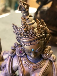 Een ingelegde verguld bronzen figuur van Vasudhara, Tibet of Nepal, 18/19e eeuw