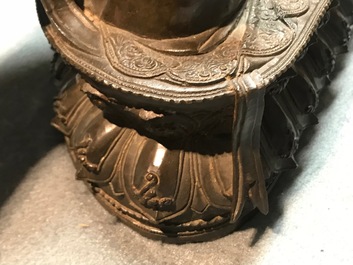 A Chinese Ming-style bronze model of Buddha, Qianlong