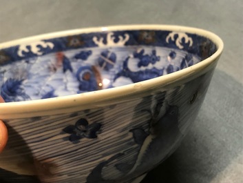A Chinese blue and underglaze red bowl with carps and marine animals, Xuande mark, Kangxi