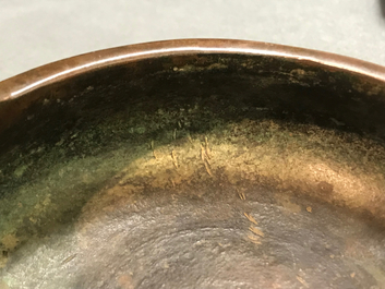 A Chinese bronze tripod censer, Xuande mark, 19th C.