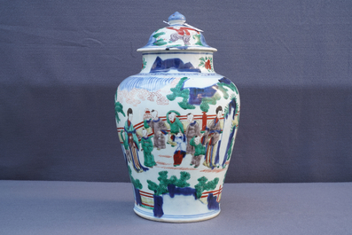 A Chinese wucai baluster vase and cover with playing boys, Transitional period