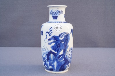 A Chinese blue and white rouleau vase with qilins, Kangxi