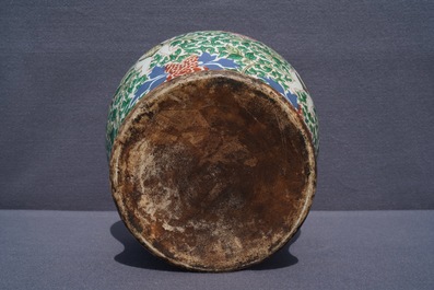 A Chinese wucai 'boys and peony scrolls' vase, 19th C.