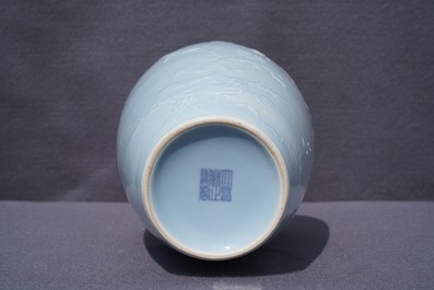 A Chinese monochrome lavender-blue vase with underglaze design, Yongzheng mark, 19th C.