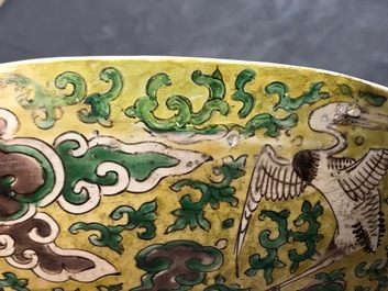 A Chinese green, yellow and aubergine-glazed biscuit 'phoenixes' dish, He He Jia Chan mark, Transitional period