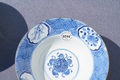 A pair of Chinese blue and white bowls, poss. for the Vietnamese market, Kangxi mark, 19th C.