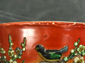 A Chinese coral-red relief-decorated bowl, 19th C.