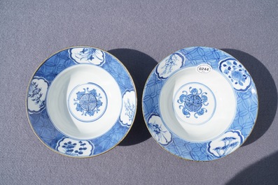 A pair of Chinese blue and white bowls, poss. for the Vietnamese market, Kangxi mark, 19th C.