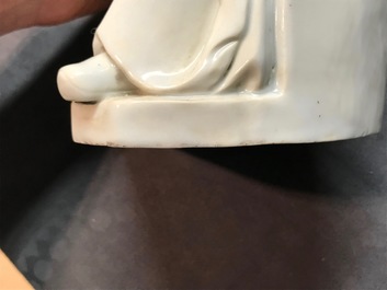 A Chinese blanc de Chine figure of Guandi, 18/19th C.
