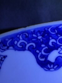 A Chinese blue and white 'Master of the Rock' dish and a famille verte dish, Kangxi