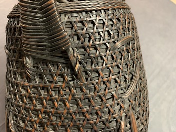 Eleven Japanese bamboo ikebana baskets including three signed examples, Meiji/Showa, 19/20th C.