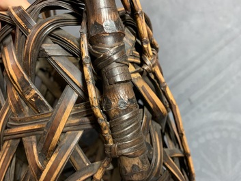 Eleven Japanese bamboo ikebana baskets including three signed examples, Meiji/Showa, 19/20th C.