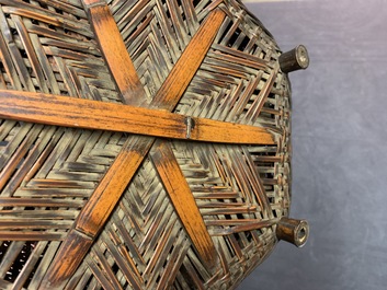 Eleven Japanese bamboo ikebana baskets including three signed examples, Meiji/Showa, 19/20th C.