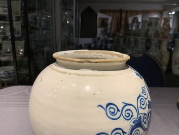 Three Dutch Delft blue and white tobacco jars with brass covers, 18th C.