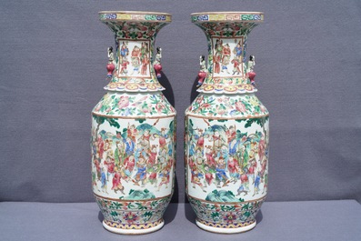 A pair of Chinese famille rose lady-handle vases, 19th C.