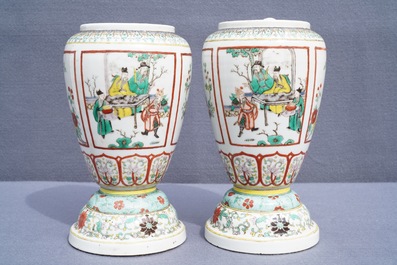 A pair of Chinese famille verte urns, 19th C.