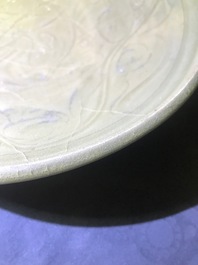 A Chinese Yaozhou celadon bowl with incised floral design, Song