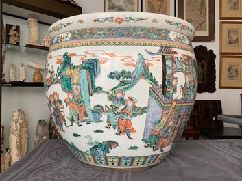 A large Chinese famille verte fish bowl with a narrative scene all-round, 19th C.