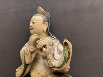 A Chinese soapstone figure of the immortal Han Xiangzi, Kangxi