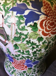 A Chinese wucai 'boys and peony scrolls' vase, 19th C.