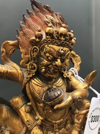 A Tibetan gilt bronze figure of Palden Lhamo, 17th C.